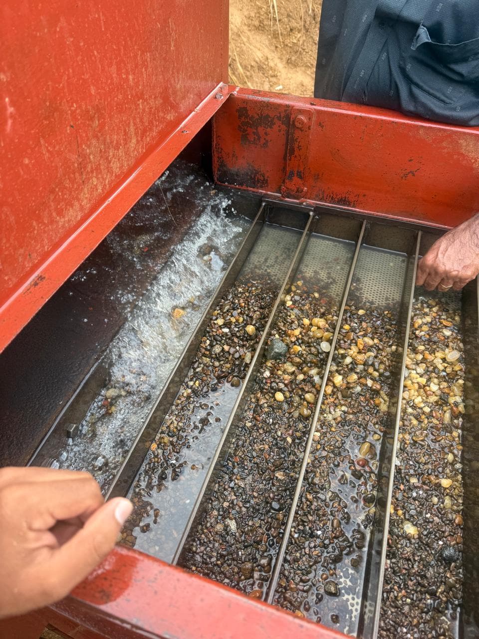 Mine workings and rough sorting on site in Sri Lanka